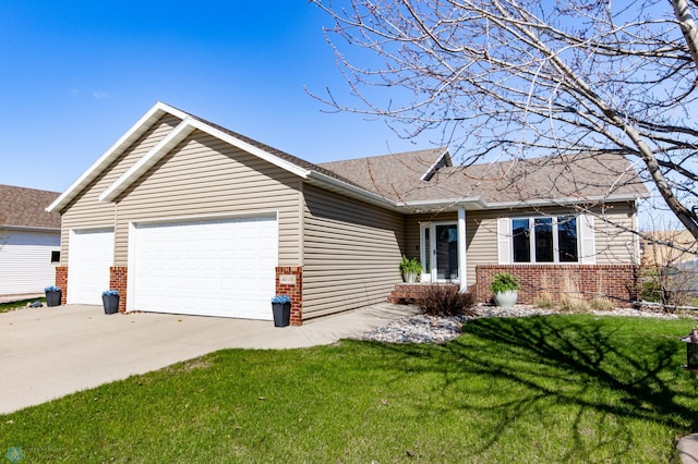 single story home featuring brick siding, an attached garage, driveway, and a front lawn