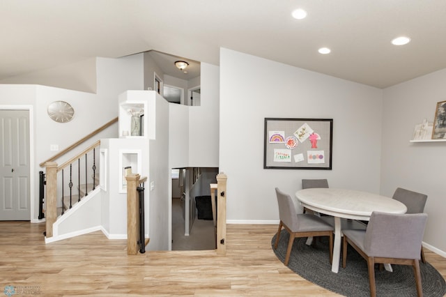 dining space with stairs, recessed lighting, baseboards, and light wood-style floors