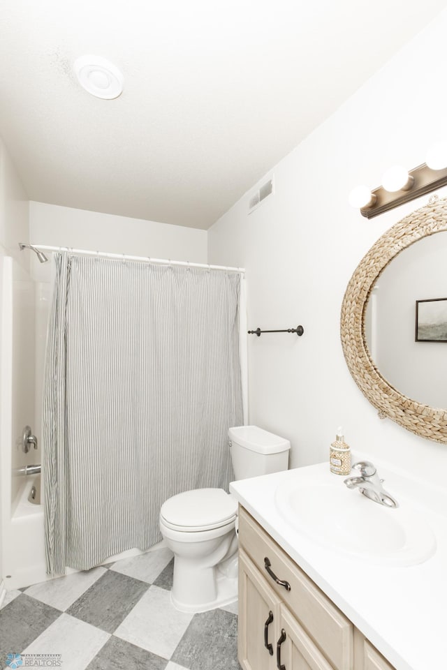 bathroom with toilet, visible vents, shower / tub combo with curtain, and vanity