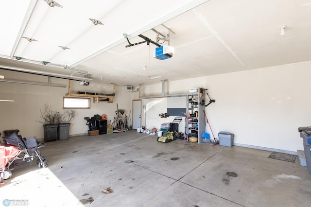 garage featuring a garage door opener