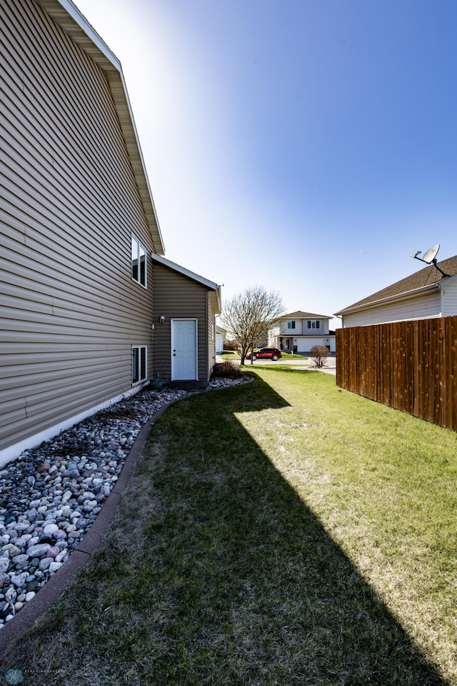 view of yard with fence