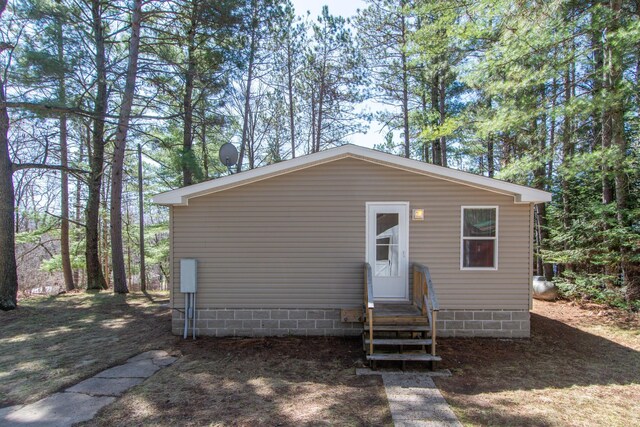 view of outbuilding featuring entry steps