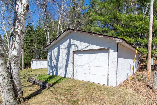 view of detached garage