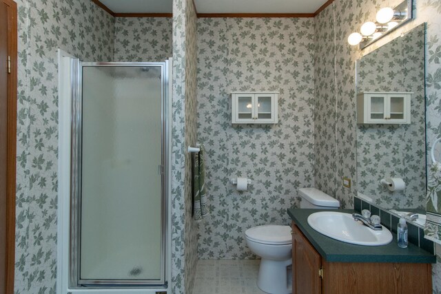 full bath with crown molding, vanity, toilet, wallpapered walls, and a shower stall