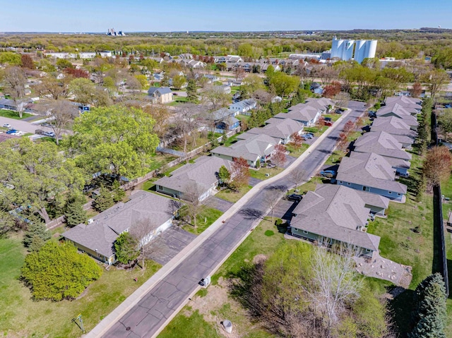 aerial view of property's location with nearby suburban area