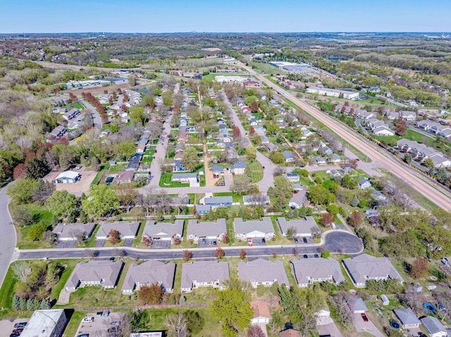 aerial view of property's location with nearby suburban area