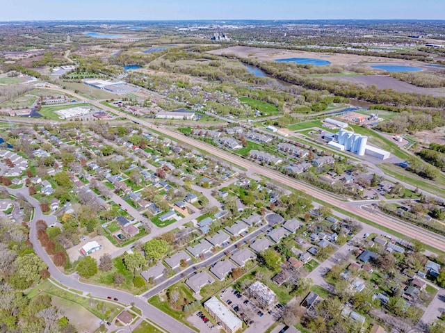 aerial view of property's location with a nearby body of water