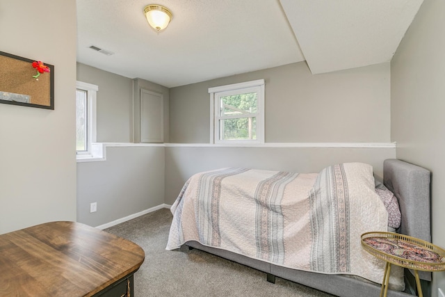 720 Mercury Dr W, Shoreview, MN 55126 - carpeted bedroom with baseboards