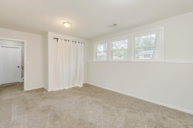 720 Mercury Dr W, Shoreview, MN 55126 - carpeted empty room with baseboards