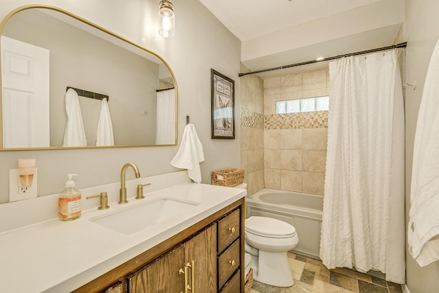 720 Mercury Dr W, Shoreview, MN 55126 - bathroom featuring vanity, shower / tub combo, and stone finish floors