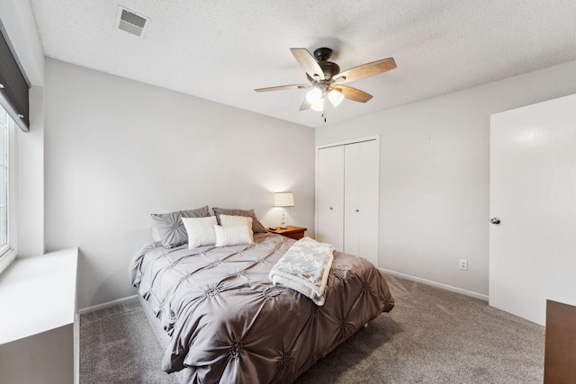 1711 121st Ln NW, Coon Rapids, MN 55448 - bedroom featuring a closet, carpet flooring, ceiling fan, and baseboards