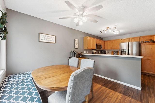 1711 121st Ln NW, Coon Rapids, MN 55448 - dining space with dark wood-style floors and a ceiling fan