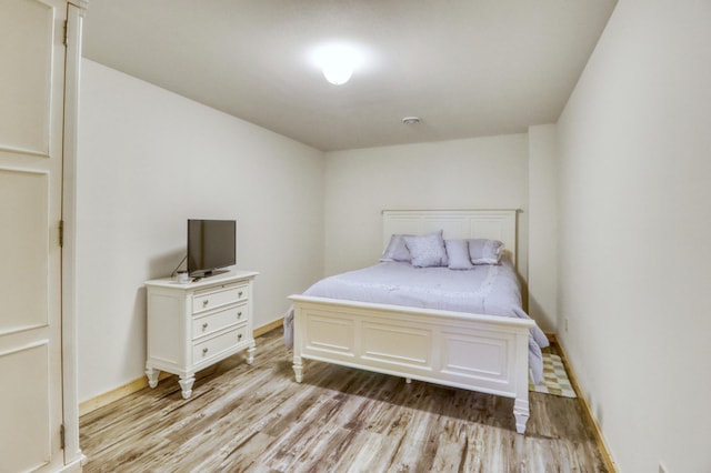 42429 Big Mcdonald Dr, Dent, MN 56528 - bedroom with light wood-type flooring and baseboards