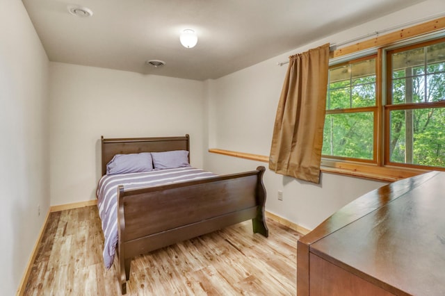 42429 Big Mcdonald Dr, Dent, MN 56528 - bedroom featuring light wood finished floors and baseboards