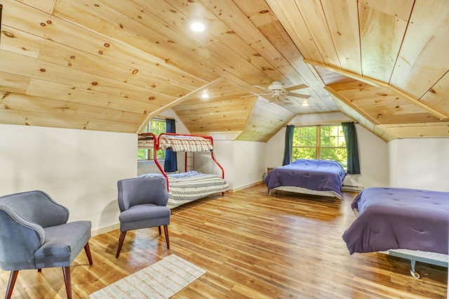 42429 Big Mcdonald Dr, Dent, MN 56528 - bedroom with wood ceiling, wood finished floors, a baseboard heating unit, vaulted ceiling, and baseboards