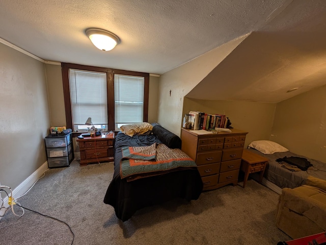 bedroom with carpet flooring and a textured ceiling
