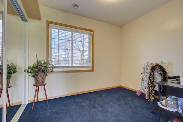 interior space featuring baseboards and carpet flooring