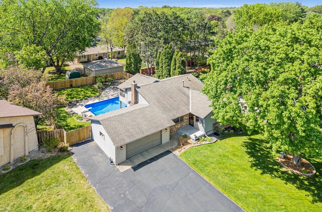 view of subject property featuring a pool area