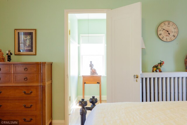 bedroom featuring baseboards