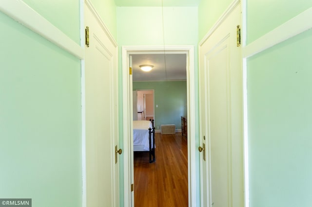 hall featuring dark wood-type flooring