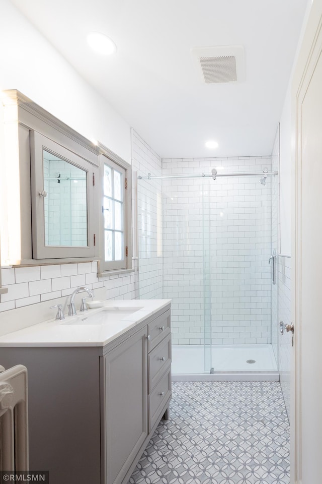 5128 Irving Ave S, Minneapolis, MN 55419 - full bathroom featuring a stall shower, vanity, and recessed lighting