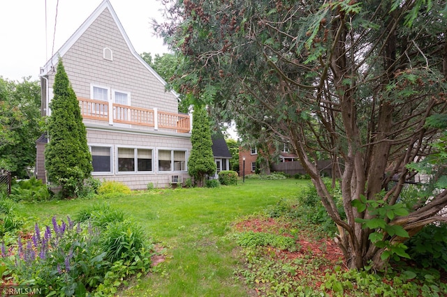 5128 Irving Ave S, Minneapolis, MN 55419 - view of grassy yard featuring a balcony