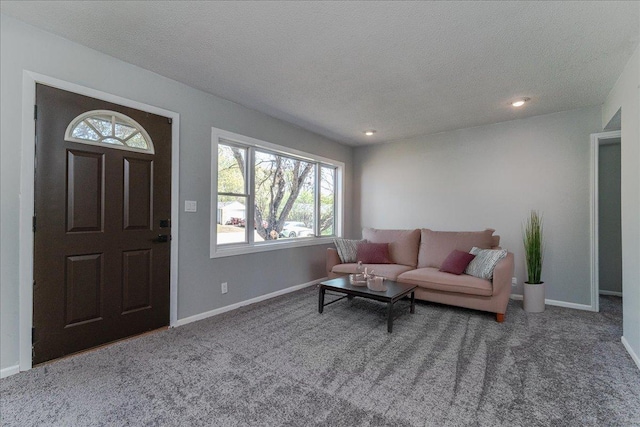 140 Carol Ln, West Saint Paul, MN 55118 - carpeted living room featuring recessed lighting, plenty of natural light, baseboards, and a textured ceiling
