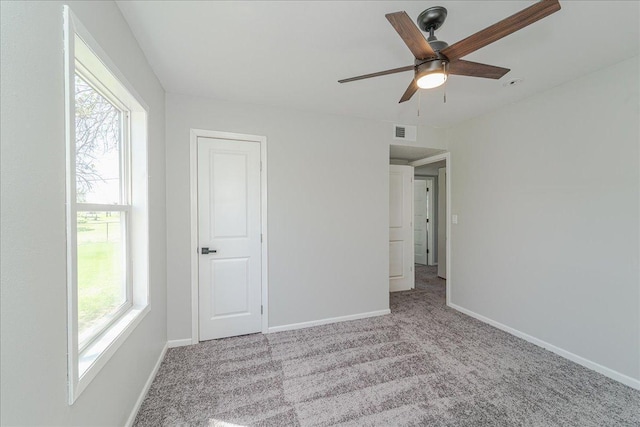 140 Carol Ln, West Saint Paul, MN 55118 - unfurnished bedroom featuring baseboards, ceiling fan, carpet flooring, and visible vents