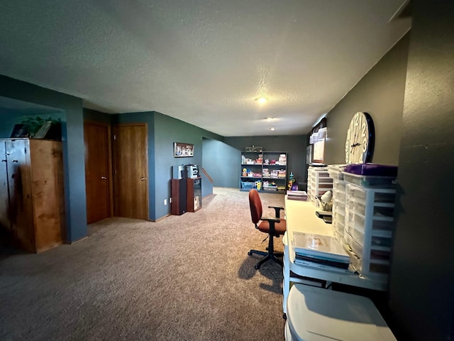 carpeted office with a textured ceiling