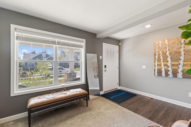 entrance foyer with baseboards, dark wood finished floors, and recessed lighting