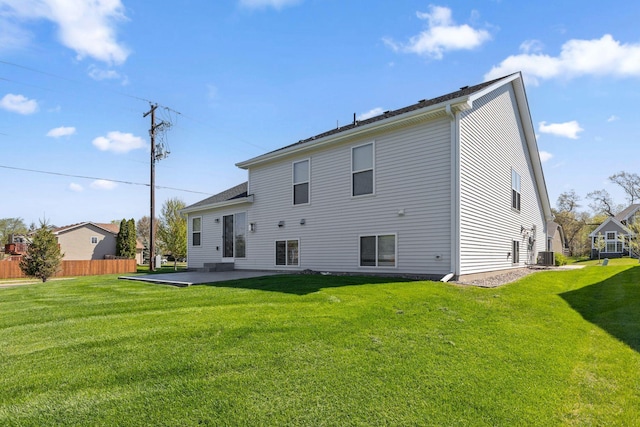 back of house featuring a patio area and central air condition unit