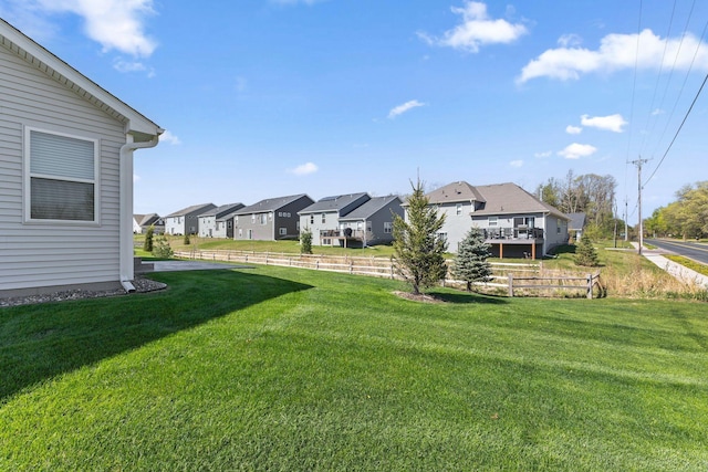 view of yard featuring a residential view