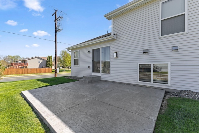 rear view of house with a patio