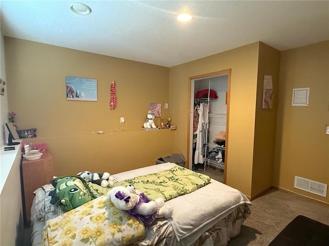 9007 Hampshire Ave N, Brooklyn Park, MN 55445 - carpeted bedroom with visible vents, recessed lighting, baseboards, and a closet