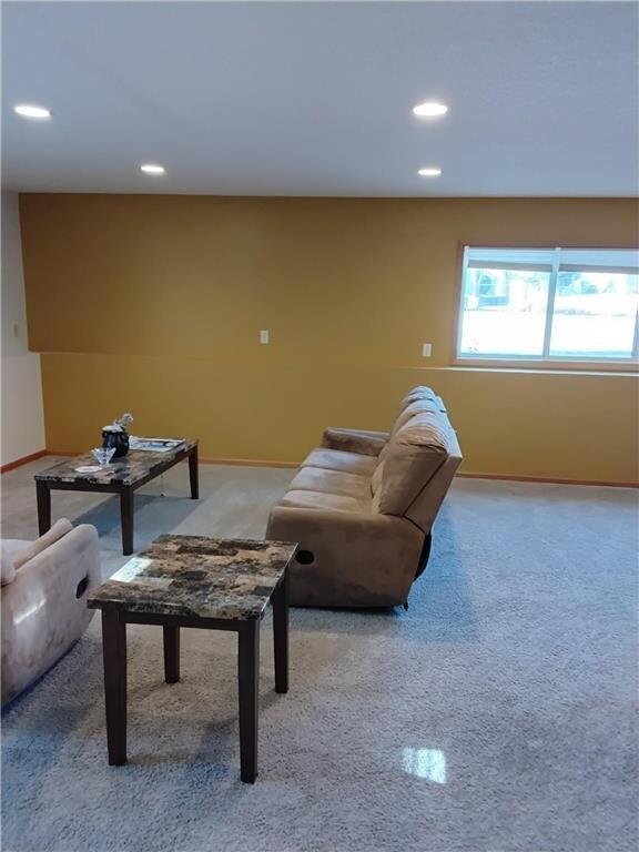 9007 Hampshire Ave N, Brooklyn Park, MN 55445 - living area with baseboards, light carpet, and recessed lighting