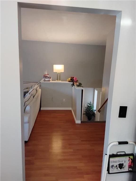 9007 Hampshire Ave N, Brooklyn Park, MN 55445 - kitchen featuring baseboards and wood finished floors