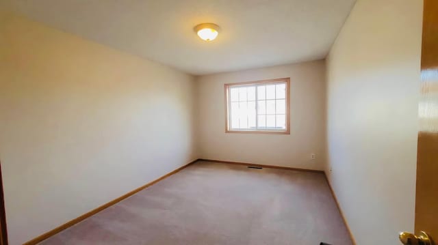 44 Willow Way, Farmington, MN 55024 - carpeted empty room featuring baseboards