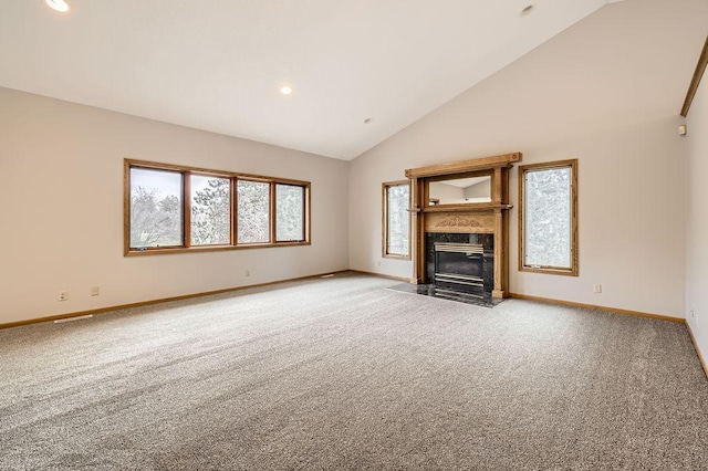 16439 Tippecanoe St NE, Ham Lake, MN 55304 - unfurnished living room with carpet, a premium fireplace, baseboards, high vaulted ceiling, and recessed lighting