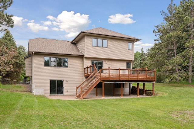 16439 Tippecanoe St NE, Ham Lake, MN 55304 - rear view of house with a wooden deck, a patio area, stairway, and roof with shingles