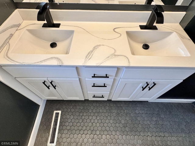 room details with vanity and visible vents