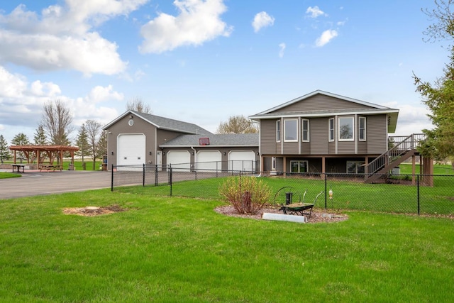 8370 Hamel Way, Morristown, MN 55052 - rear view of house featuring driveway, a garage, and stairway