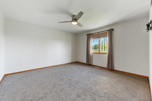 8370 Hamel Way, Morristown, MN 55052 - carpeted spare room with ceiling fan and baseboards