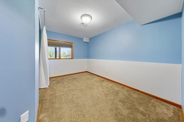 8370 Hamel Way, Morristown, MN 55052 - carpeted empty room with a textured ceiling and baseboards