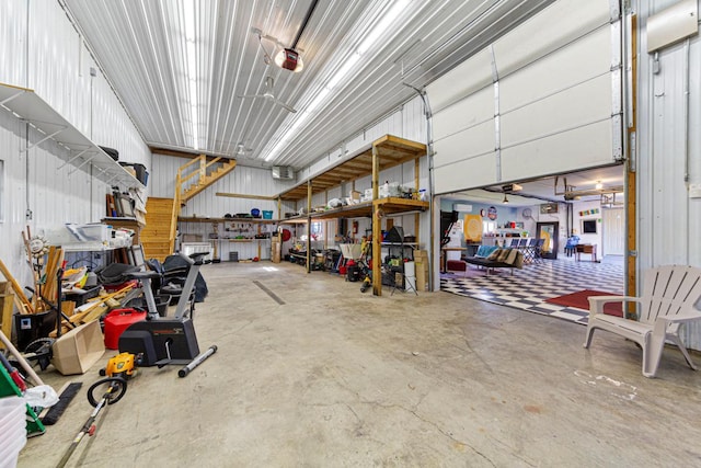 8370 Hamel Way, Morristown, MN 55052 - garage with a garage door opener and a workshop area