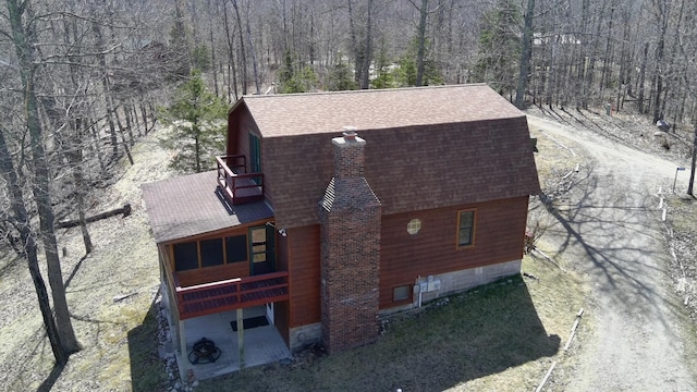 bird's eye view with a forest view