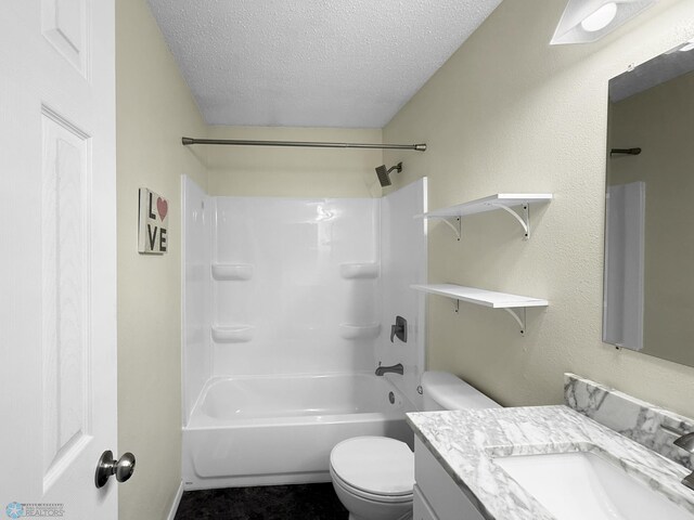 full bath featuring toilet, a textured ceiling, bathing tub / shower combination, and vanity