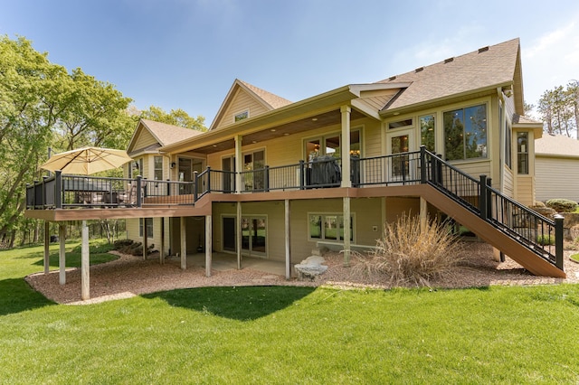 1315 Wicklow Ln SW, Rochester, MN 55902 - rear view of property featuring a wooden deck, stairway, a yard, and a shingled roof