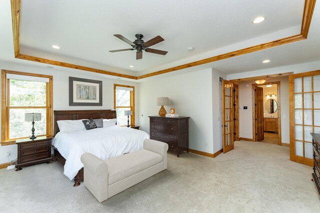 1315 Wicklow Ln SW, Rochester, MN 55902 - bedroom featuring baseboards, multiple windows, a tray ceiling, and recessed lighting
