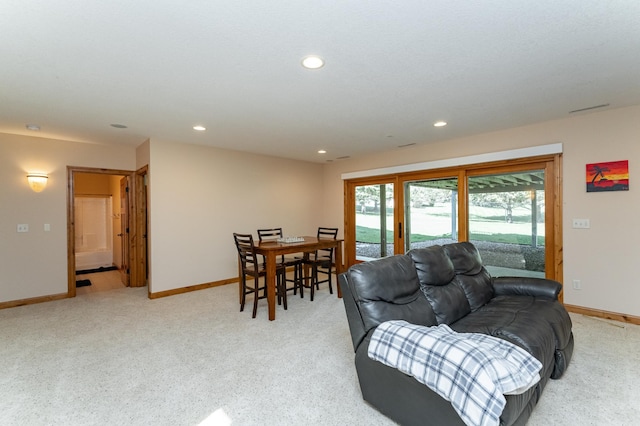 1315 Wicklow Ln SW, Rochester, MN 55902 - living room with baseboards, light carpet, and recessed lighting