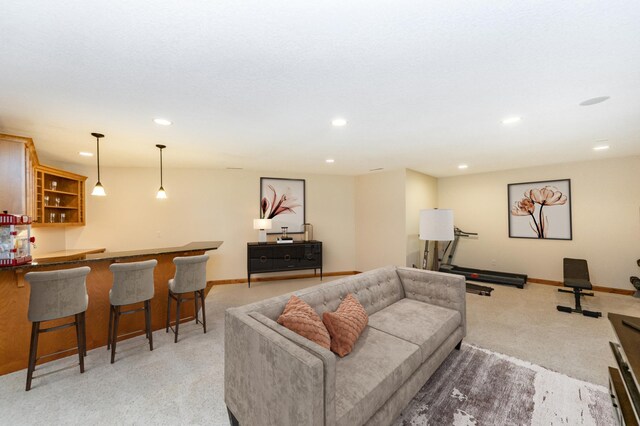 1315 Wicklow Ln SW, Rochester, MN 55902 - living room with light colored carpet, recessed lighting, bar, and baseboards